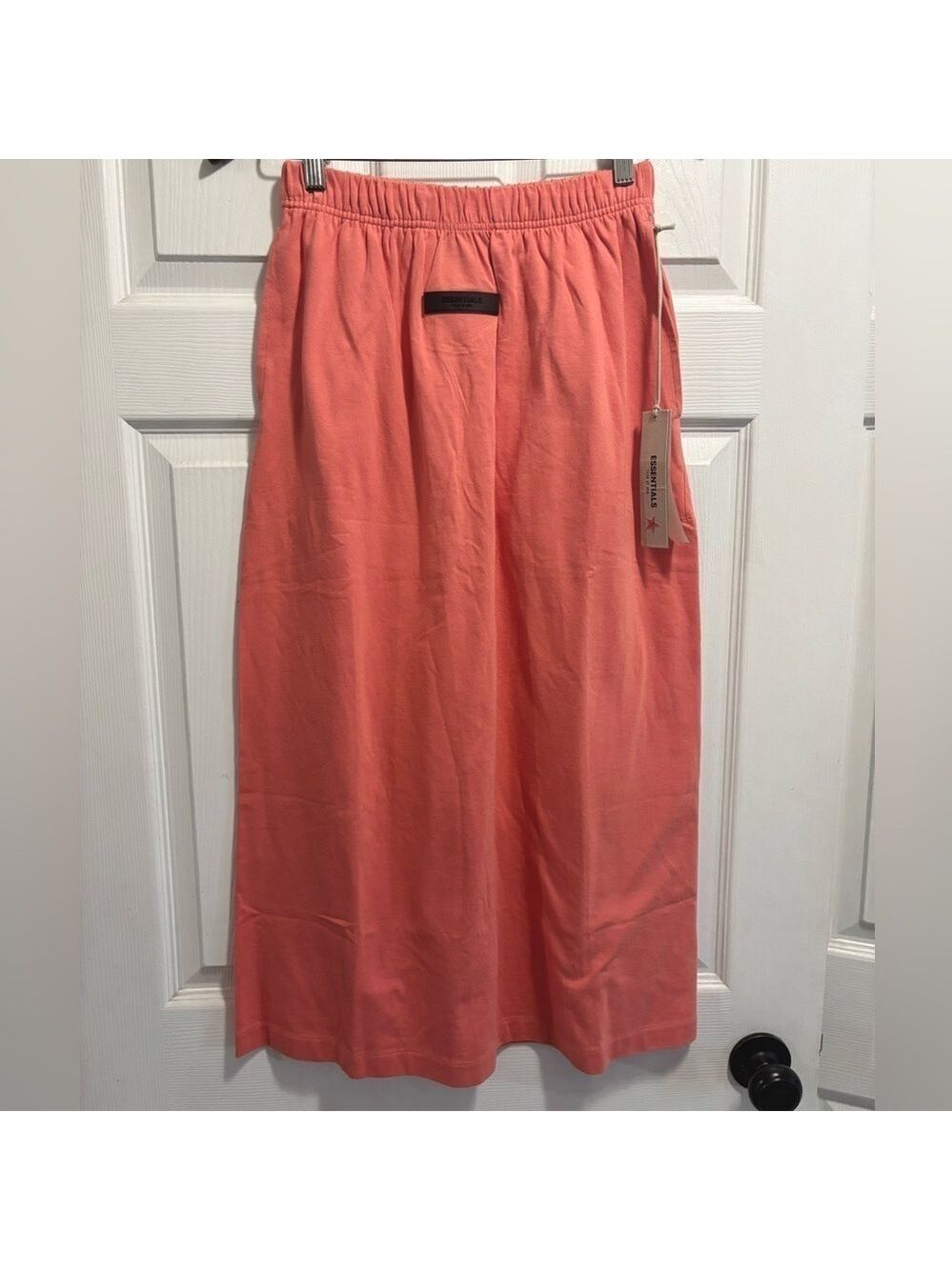 NWT FOG Essentials Fear of God Women's
Jersey Long Skirt Coral Small BRAND NEW